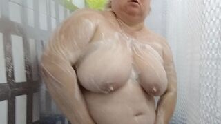 Naked stepmom with big tits and ass takes a shower