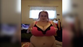 She gives herself a massage on her big tits, fat Abigail.