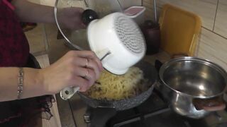 Mommy MILF without panties in stockings high heels continues nude cooking, shows pussy, boobs, nipples, butt and cooks pasta nautically  in kitchen. Ass pussy tits legs mom MILF