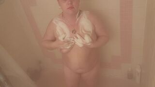 Sexy brunette MILF sneaks in a few orgasms and a couple cigarettes in the shower... almost caught!