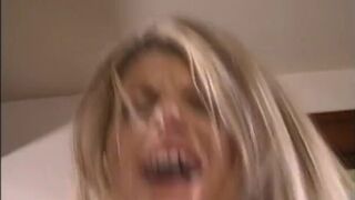 Beautiful blue eyed babe gets a warm load all over her pretty face