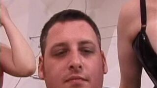 Whores with massive tits and cleavage wearing latex bind and gag a guy in hot fetish sex scene