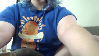 Milf Using hitachi while playing video games