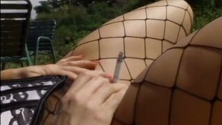 Brunette nymph in fishnets sucks meaty dick while gets fuck