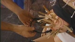 Chubby whore with paper bag on head has her jugs and cunt