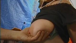 Chubby whore with paper bag on head has her jugs and cunt