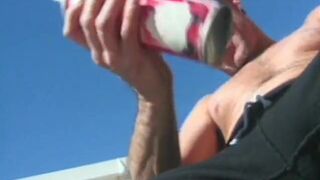 Couple get covered with whipped cream and lick each other