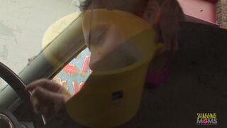 Stacey Saran washes a car before getting her throat and pussy drilled