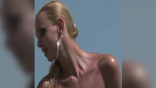 Photo shoot on the beach show softcore tits - 15 image