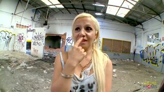 This blonde nympho does not hesitate to ride his big cock in the abandoned building