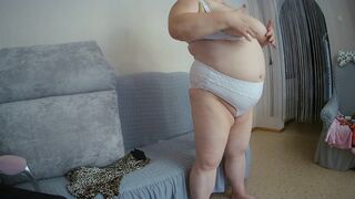 Mother-in-law with big tits caresses herself in front of the camera