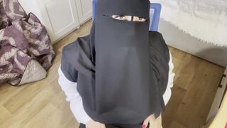 A Turkish woman with beautiful eyes in a hijab masturbates in pantyhose