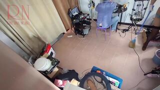 A undressed maid is cleaning up in an silly IT engineer's office. Real camera in office. two