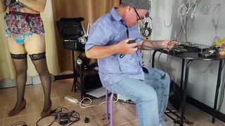 A undressed maid is cleaning up in an silly IT engineer's office. Real camera in office. two