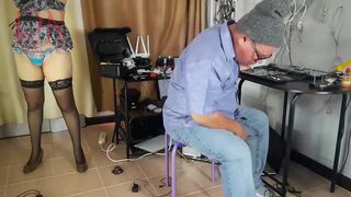 A undressed maid is cleaning up in an silly IT engineer's office. Real camera in office. two