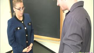 Stacy Starr dominates and punishes her classroom jerk with her huge natural tits and expert handjob skills