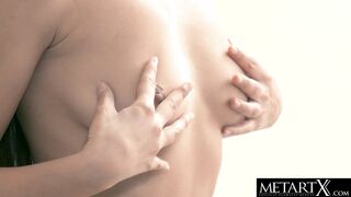 Asian beauty plays with her big natural tits and shaved pussy