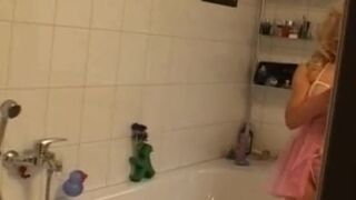 Hot blonde German MILF with huge round boobs making a cock cum