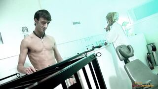 Blonde nurse watching a caged chick fuck with a patient