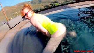 Red XXX fucks her pussy with a toy in the pool