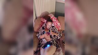 Caught gamer girl in panties and bra playing video games with legs wide open