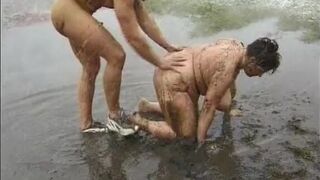 Fat woman fucked outdoors in the mud