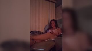 Cute busty Gamer girl playing Fortnite in dress