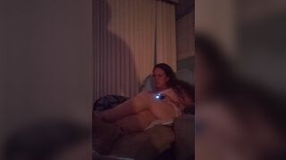 Cute busty Gamer girl playing Fortnite in dress