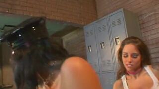 Woman gets fingered and fucked with a strapon behind bars